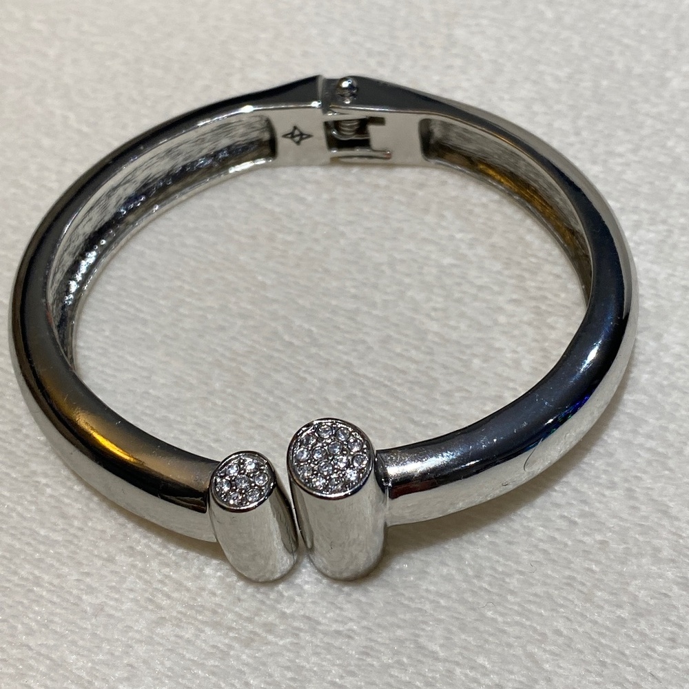 BCBG rhinestone and silver toned bracelet